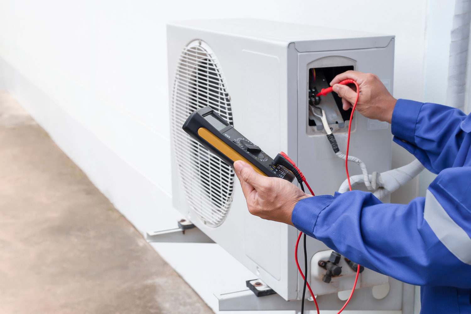 plumber testing heat pump in vancouver